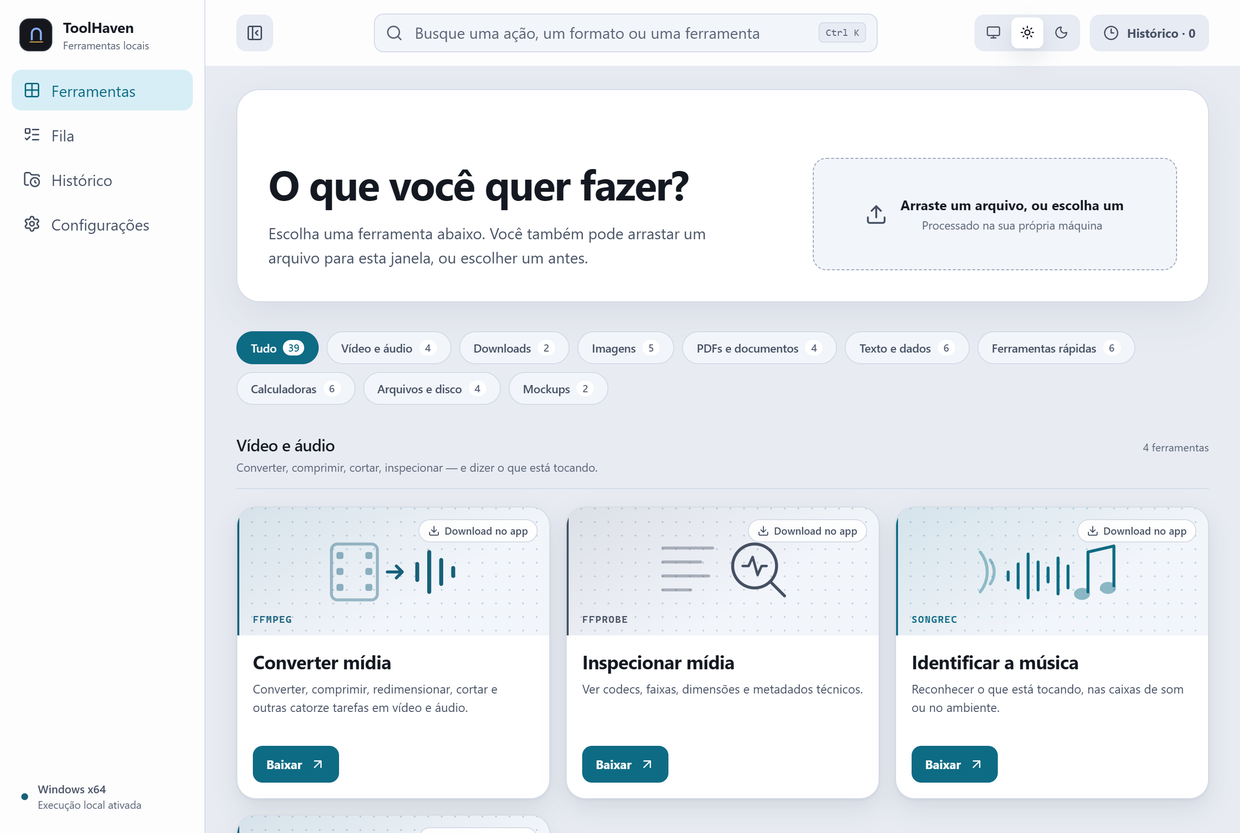 O catálogo do ToolHaven no Windows: um campo de busca no topo, uma barra lateral com Ferramentas, Fila, Histórico e Configurações, categorias de vídeo, downloads, imagens, documentos, dados, ferramentas rápidas, calculadoras, arquivos e mockups, e uma grade de cartões para converter mídia com FFmpeg, inspecionar streams com ffprobe e reconhecer a música que está tocando.